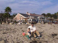 Dad helps with sand sculptures.jpg (47472 bytes)