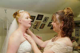 Mom adjusts the Bride.jpg (201922 bytes)